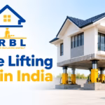 House lifting cost in India banner showing an SRBL-branded house raised with hydraulic jacks and a rupee symbol representing service cost.